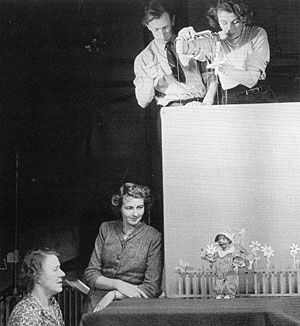 The puppeteers are Martin Grainger and Audrey Atterbury and looking on are Maria Bird and Janet Ferber.