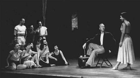 A class photo at the Henry Street Playhouse taken in 1949. Identified persons are, on left standing: Luke Bragg, Sheldon Ossosky, and Murray Louis; front seated: Anita Lynn, Phyllis Lamhut, ***, Nancy Robb (front), Martha Howe (rear), Murray Gitlin, and ***; on right: Alwin Nikolais and Gladys Bailin.